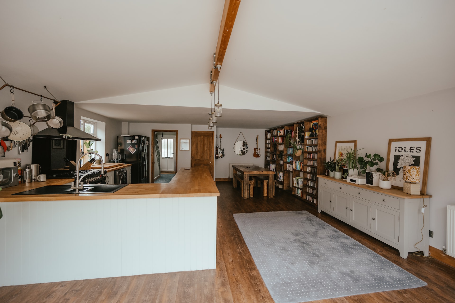 a kitchen with a rug