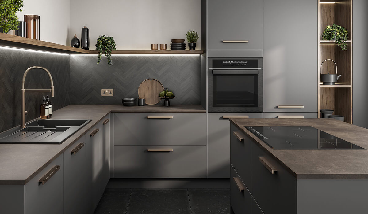 modern dust grey kitchen with concrete colour worktops and herringbone splashback