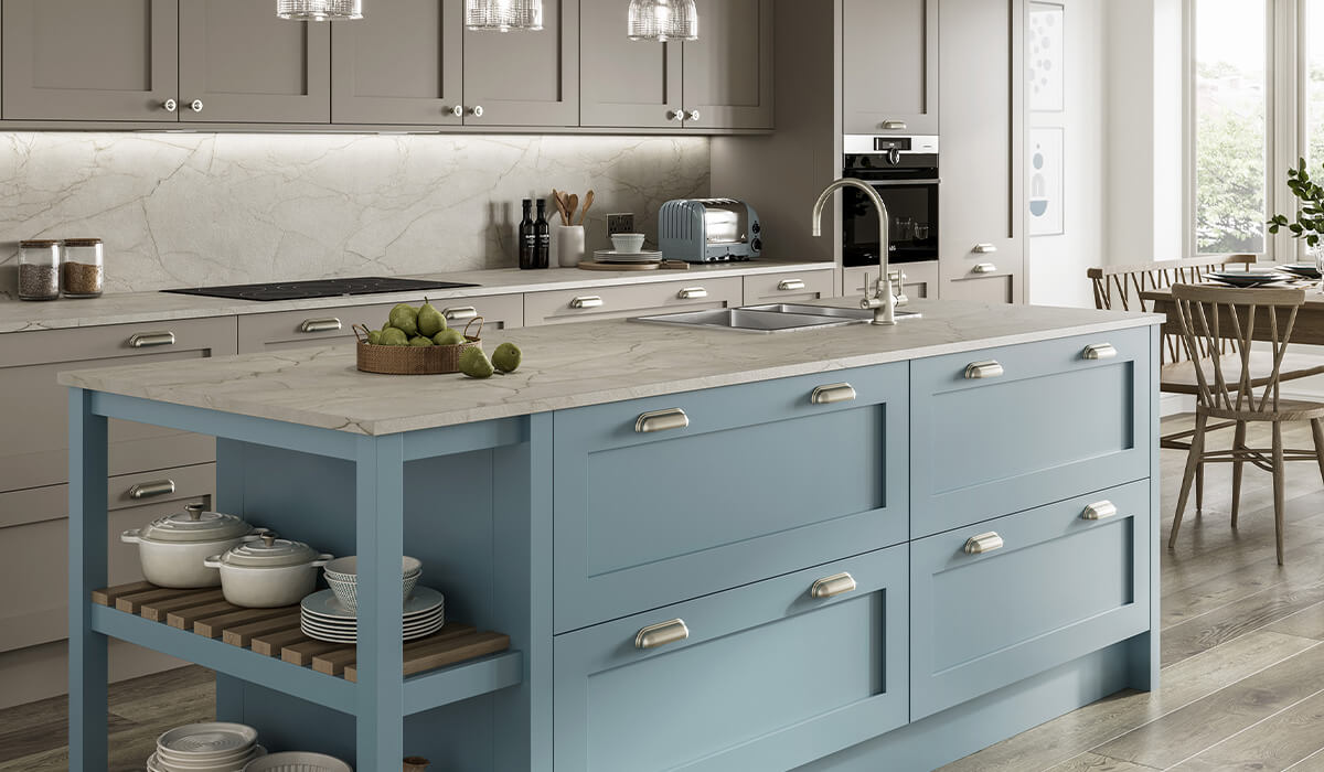 blue kitchen island with marbled worktop