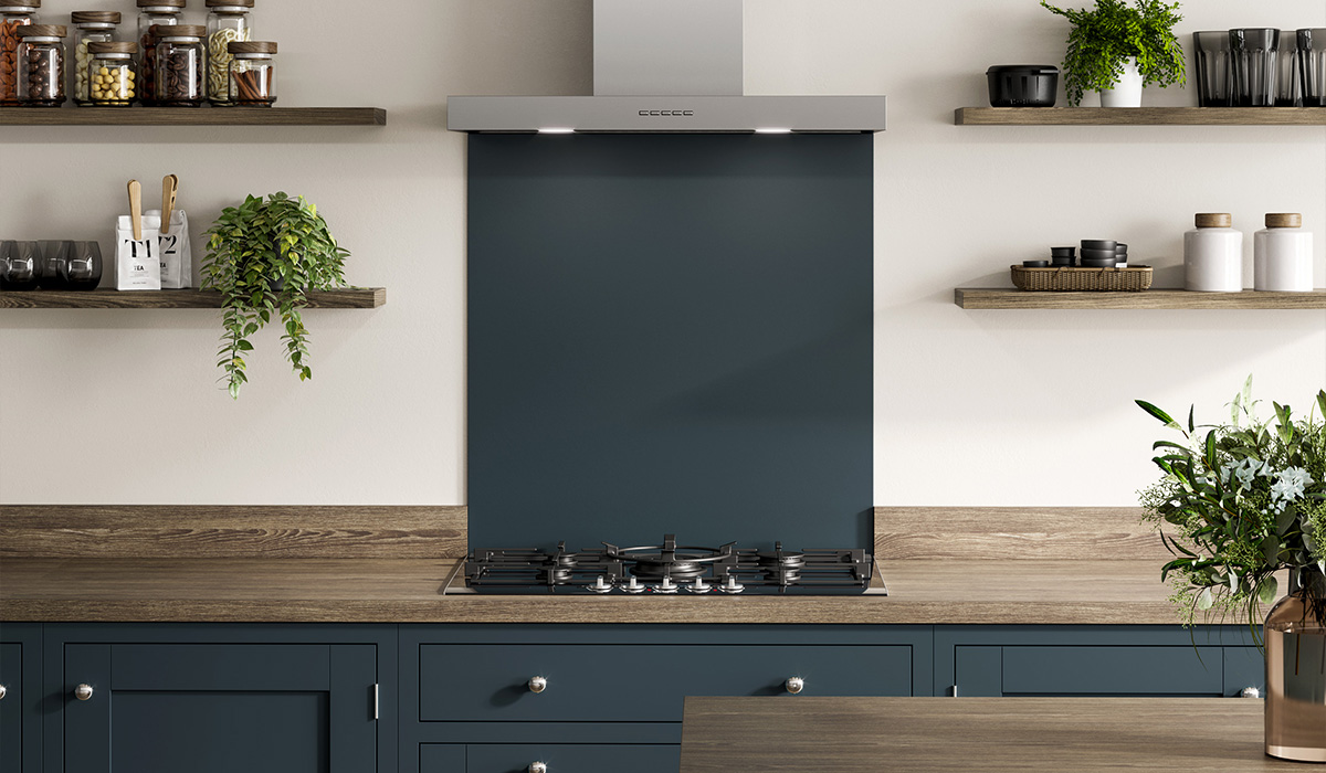 Oak Laminate worktop with dark blue kitchen doors and glass splashback